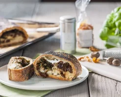 Spinatrolle mit Taleggio